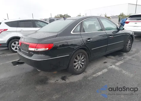 2009 Hyundai Azera Limited z USA, uszkodzony, nr VIN KMHFC46F69A342687